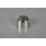 Channel Island Silver - A Bruce Russell silver mounted magnifier paperweight, of typical circular