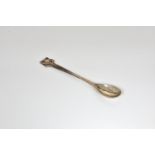 An exceptional Omar Ramsden Arts & Crafts silver spoon, Omar Ramsden, London 1922, with planished,