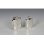 A matched graduated pair of silver spirit flasks, the larger by Cooper Brothers & Sons Ltd.,