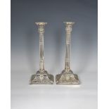 Pair of George III silver Corinthian column candlesticks, James Young, London, 1772, with cluster