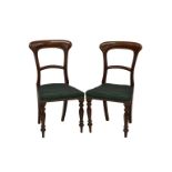 A Pair of mid-19th century balloon back chairs, the stuff over seats upholstered in bottle green