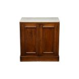 A Victorian marble topped mahogany boot cupboard, the marble top over two single panel cupboard