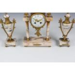 A French 19th century gilt metal and marble portico clock garniture, the drum case with floral
