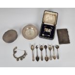 A group of silver smalls, including a silver charm bracelet; a Birks (Canadian) oval engine turned