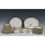 A Royal Doulton ‘Belmont’ pattern part dinner service, with gold encrusted band and gold scrolls and