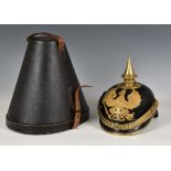 A First World War style German /Prussian pickelhaube with 1813 iron cross, leather bodied shell,