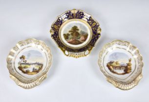A pair of Spode shell shaped topographical dessert dishes, one with black factory painted mark,