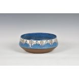 A vintage Royal Copenhagen Fajance bowl, stylised flowers in blues, purples and browns, tapering