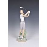A Lladro figure 'The Perfect Drive' No 6689, 14 1/2 in. (36.8cm) high. * Condition: Good, nothing to