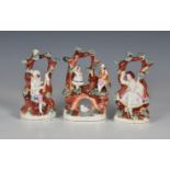 A Staffordshire figural group, mid 19th century, of a couple above an arched bridge with a swan