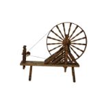 A George IV painted Jersey spinning wheel dated 1829, the base/table, drive wheel spokes and all
