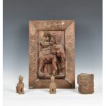 An Indian carved wooden panel, first half 20th century, carved in high relief with an elephant