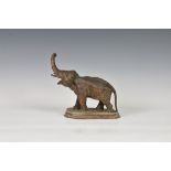 A realistically modeled copper elephant figure, probably early 20th century, modelled with raised