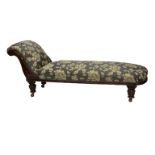 A Victorian stained walnut chaise longue with silk damask upholstery, on tapering gadrooned legs, 72