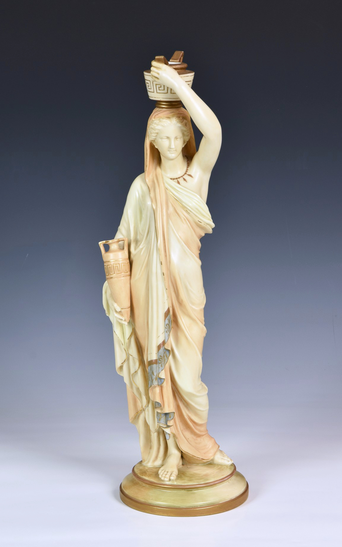 A Royal Worcester porcelain figure of a Grecian water carrier, date code 1891, puce printed and