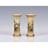 A pair of Royal Worcester porcelain sheep painted trumpet spill vases by Harry Davis, each painted