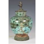 An antique Chinese turquoise glazed vase, probably for the Islamic market, converted to a lamp,