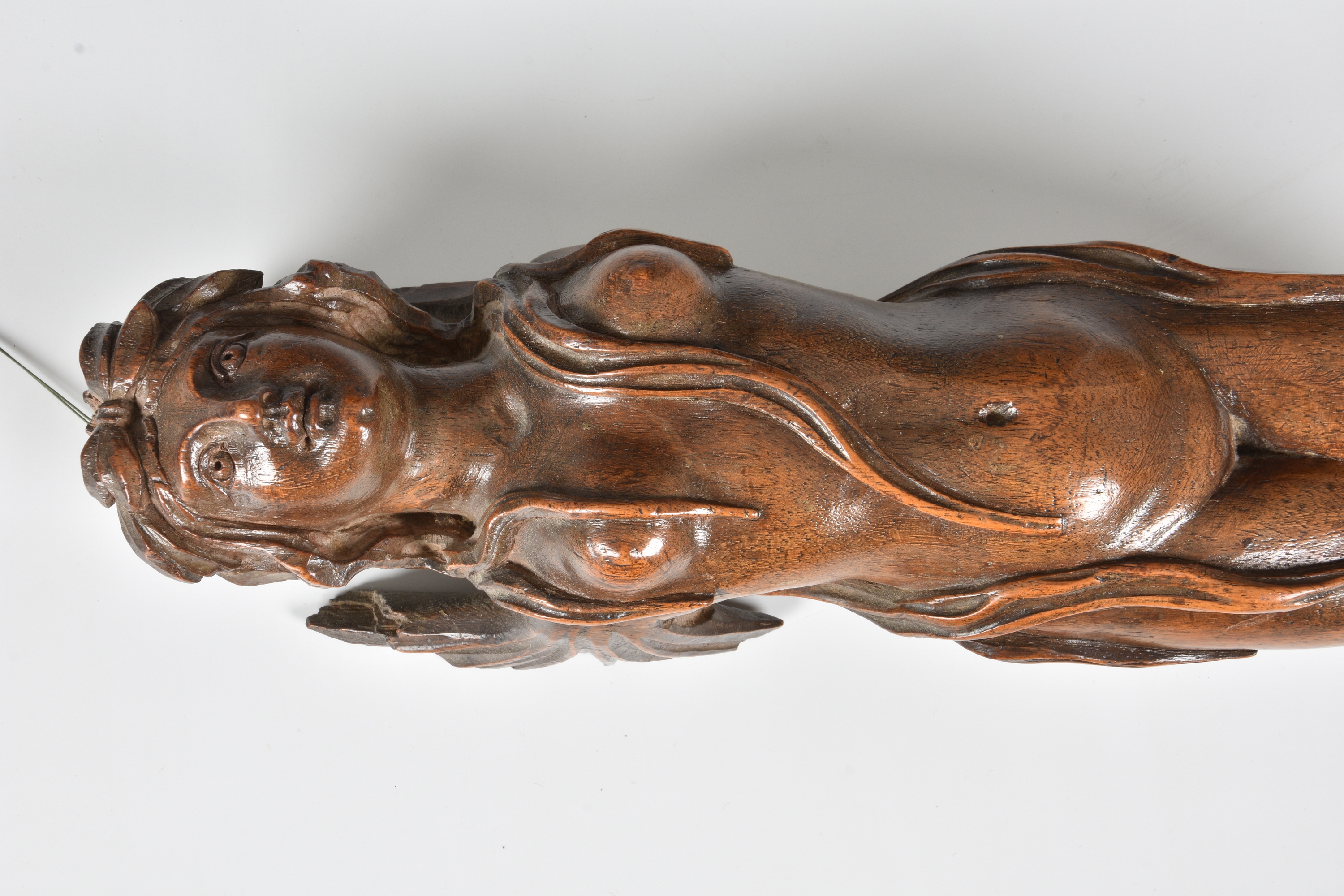 A carved wooden wall applique figure of a mermaid, probably 19th century, with short, fin-style - Image 2 of 3