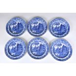 A set of six blue and white pearlware plates, 19th century, of octagonal petalled form with gilt