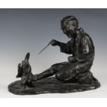 A large Japanese patinated bronze of a sarumawashi or monkey trainer, probably Meiji period (1868-