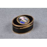 A rare and fine quality oval black tortoiseshell and gold portrait snuff box, 18th century, the