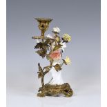 A Samson porcelain ormolu-mounted bird candlestick, 19th century, composed of a porcelain bird