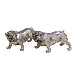 A pair of large chrome bulldog figures, with diamante studded collars, chrome finished resin, 15½in.