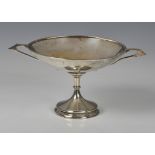An Art Deco style silver two handled tazza, Walker & Hall, Sheffield 1910, of saucer form with