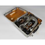 A 20th century Soviet Russian microscope in a fitted metal case, 10 1/8 x 8 1/8in. (25.7 x 20.