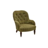 A Victorian easy armchair in olive green upholstery, with a buttoned back and serpentine stuff