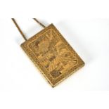 A Japanese gilt metal and niello compact in the style of Komai, 1920s-30s, the exterior decorated