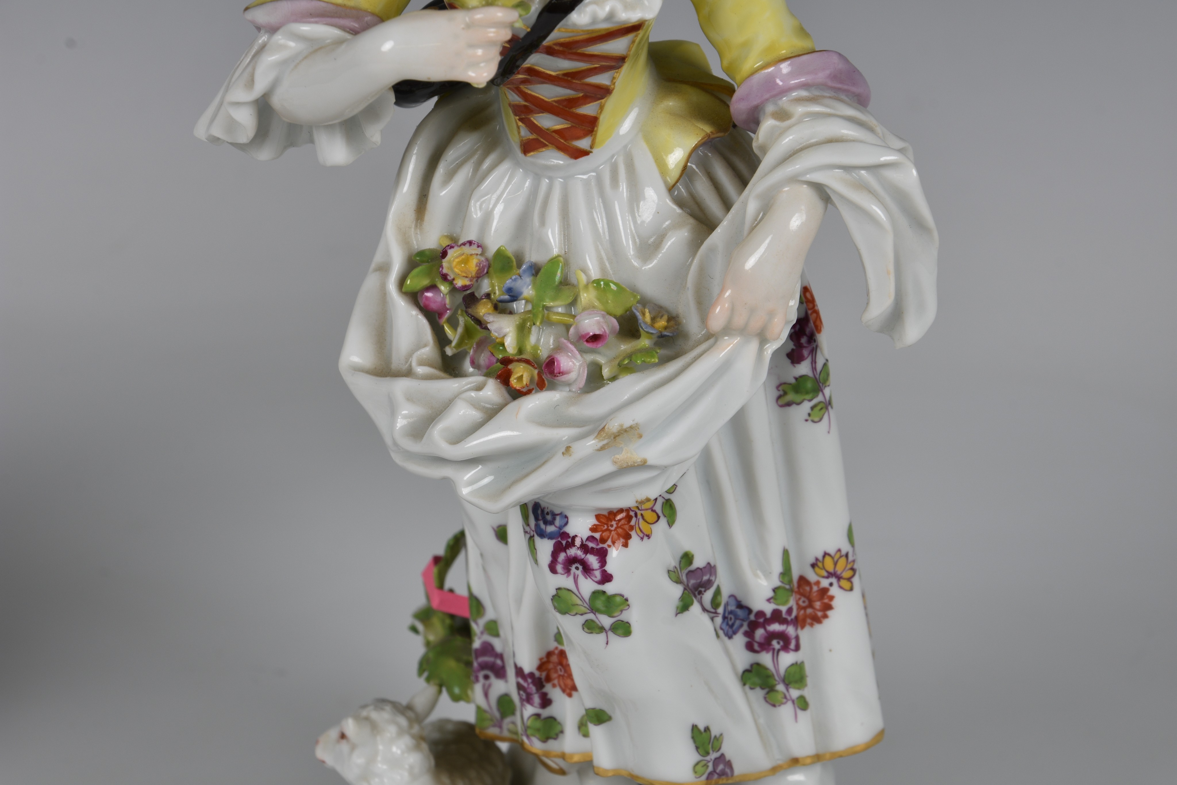 A pair of Meissen figures of a gallant and his companion, early 20th century, the man holding a - Image 6 of 8