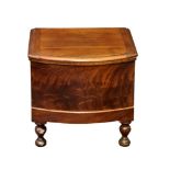 A Victorian mahogany bowfront step commode with china lidded potty and pull-out lower drawer with