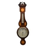 An Edwardian mahogany 'banjo' aneroid barometer in the Sheraton style, with satinwood shell and