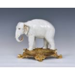 An ormolu mounted Sampson white porcelain elephant , after Meissen, 19th century, realistic