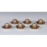 A set of six Crown Staffordshire coffee cans & saucers, floral decorated with gilt highlights on