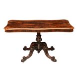 A Victorian serpentine rosewood centre table, the top with moulded edge over a crossbanded frieze
