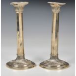 A pair of Gorham sterling silver candlesticks, 1920s-30s, in the Art Deco taste, of slightly