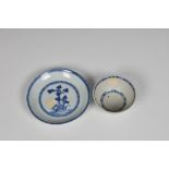 A Chinese blue and white porcelain tea bowl and saucer from The Nanking Cargo, Qianlong period, c.