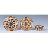 A Royal Crown Derby Imari pattern trio, comprising tea cup, saucer and 6in. side plate, printed