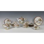 A Japanese eggshell porcelain tea service, mid-20th century, comprising a teapot, cream jug, twin