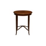 An Edwardian circular satinwood banded mahogany occasional table, the circular top with moulded edge