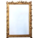 An 18th century style gilt framed mirror, late 20th century, the rectangular bevelled plate within a