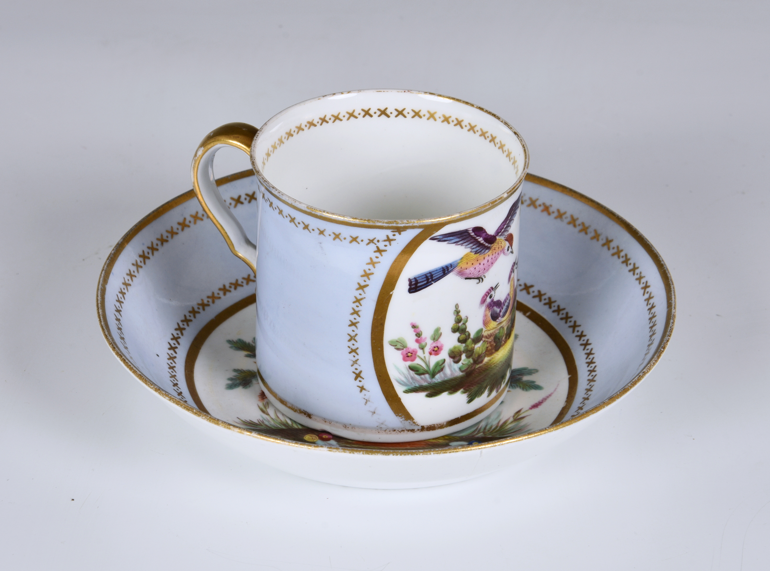 A Spode porcelain coffee can and saucer, early 19th century, with painted reserves of exotic - Image 2 of 4