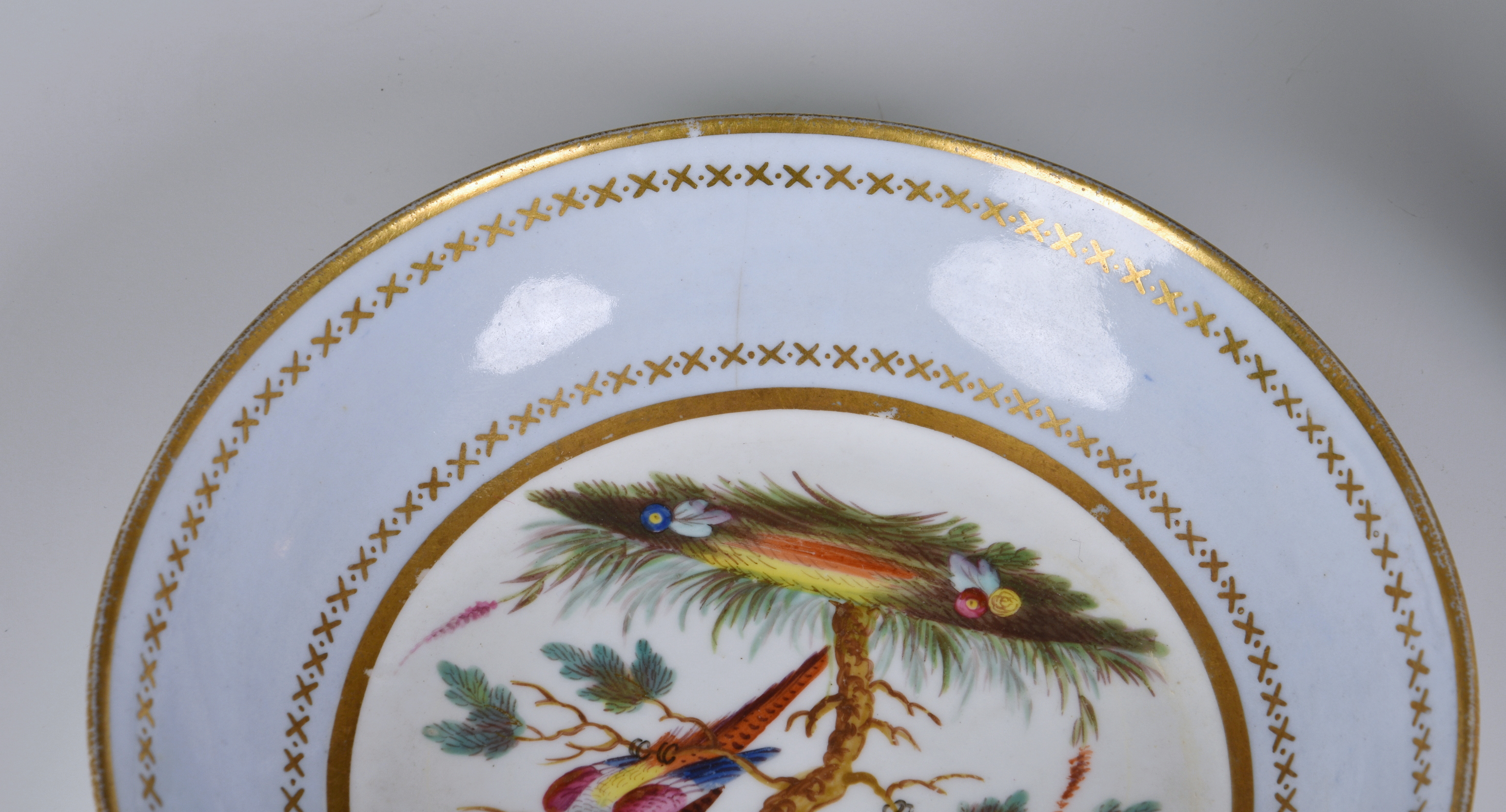 A Spode porcelain coffee can and saucer, early 19th century, with painted reserves of exotic - Image 3 of 4