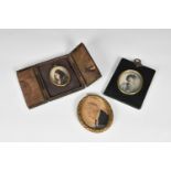 Three 19th and early 20th century portrait miniatures, one a profile miniature of a gentleman, oval,
