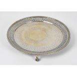 A Victorian silver card waiter, George Richards Elkington, London 1868, circular with chased foliate