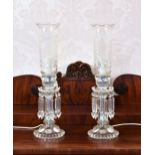 A pair of Baccarat style glass lustre storm lamps, 1980s-90s, the moulded glass candlestick base