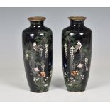 A pair of midnight blue ground Japanese cloisonné enamel vases, Meiji period (1868-1912), of