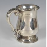An Elizabeth II silver baluster tankard, Pinder Brothers, Sheffield 1956, with foliate capped joined
